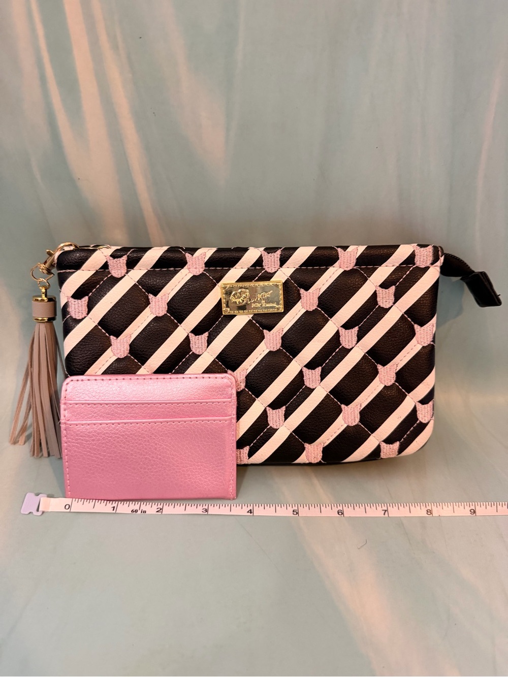 Betsey Johnson Black and Pink Patterned Wristlet Pouch with Tassel